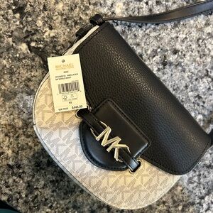 Michael Kors Black Crossbody Bag with Gold Hardware and Pebbled Leather